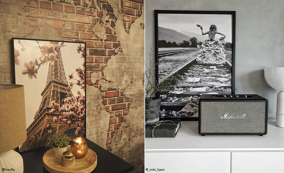 Tavla på eiffeltornet mot tegeltapet - svartvit tavla och högtalare